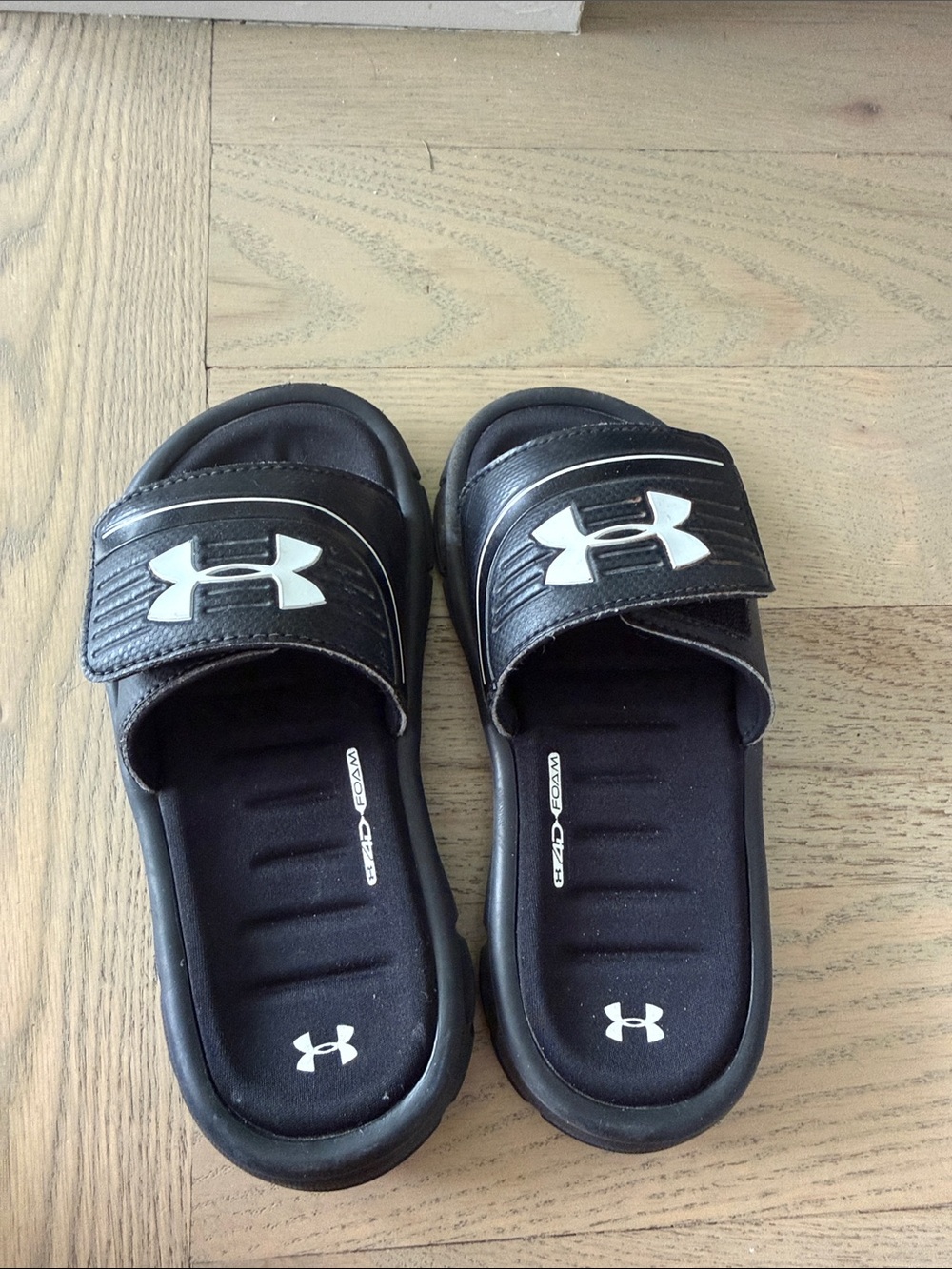Under Armour Black and White Slide Sandals